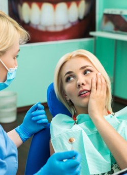 woman needing emergency dental care